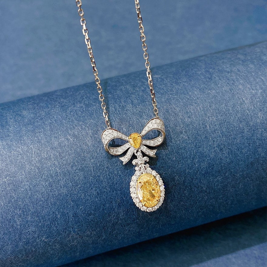 14k Gold 1.45 Ctw Natural Yellow Diamond & Diamond Necklace: Ref:231144018 // gold content:14k gold // main gemstone:yellow diamond // shape:oval // carat weight:1ct // color:yellow // treatment:natural // // adjacent gemstone 2 : diamond // shape:round //