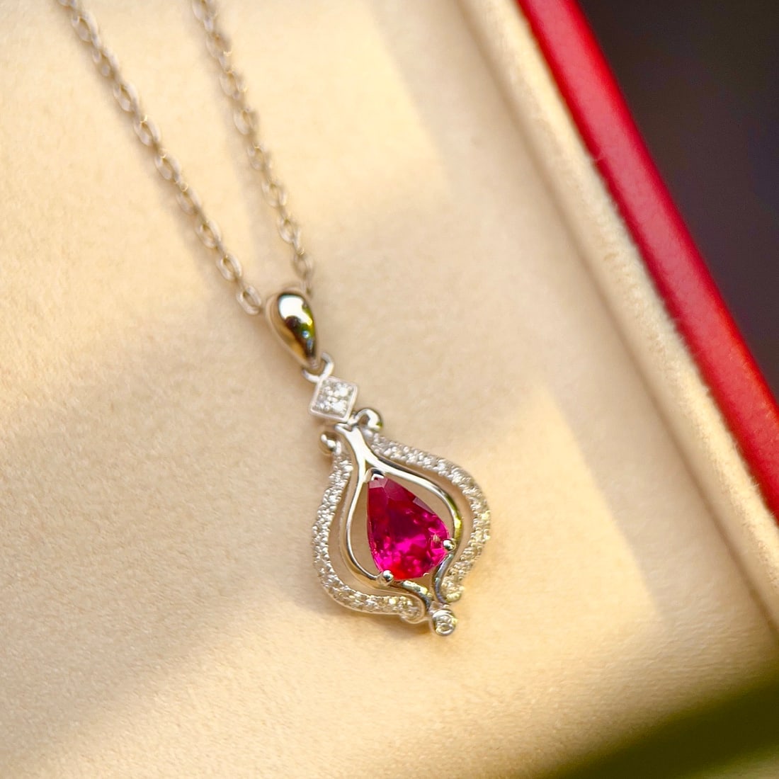 14k Gold 0.6 Ct Natural Ruby & Diamond Pendant( Without Chain ): Ref:231144130 // gold content:14k gold // main gemstone:ruby // shape:pear // carat weight:0. 6ct // color:red // treatment:natural // // adjacent gemstone 2 : diamond // number of stones:31 // shape: