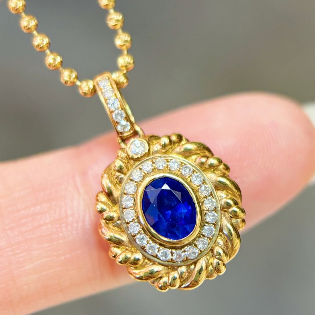 14k Gold 0.94 Ctw Natural Sapphire & Diamond Pendant( Without Chain ): Ref:231144152 // gold content:14k gold // main gemstone:sapphire // shape:oval // carat weight:0. 80ct // color:blue // treatment:natural // // adjacent gemstone 2 : diamond // shape:round // carat