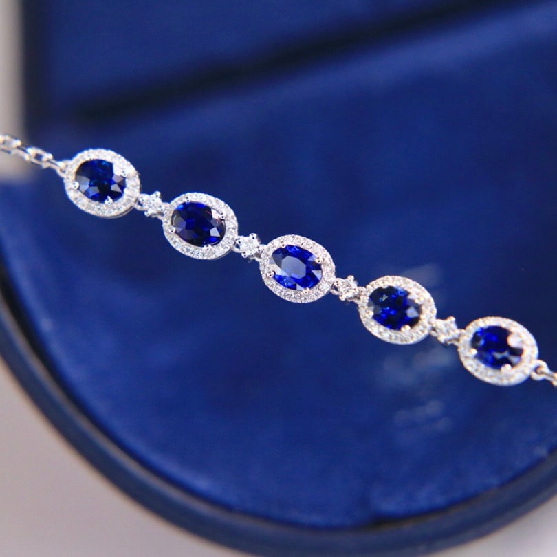 14k Gold 2.16 Ctw Natural Sapphire & Diamond Bracelet: Ref:231144181 // gold content:14k gold // main gemstone:sapphire // shape:oval // carat weight:1. 9ct // color:blue // treatment:natural // // adjacent gemstone 2 : diamond // shape:round // carat