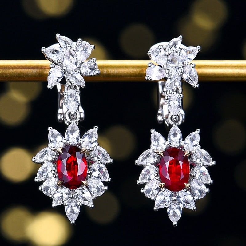 14k Gold 3.63 Ctw Natural Ruby & Sapphire Earrings: Ref:231144237 // gold content:14k gold // main gemstone:ruby // shape:oval // carat weight:1. 08ct // color:red // treatment:natural // // adjacent gemstone 2 : sapphire // number of stones:40 // shap
