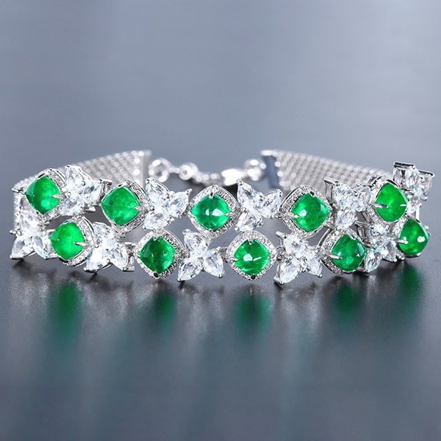 14k Gold 13.05 Ctw Natural Emerald & Sapphire Bracelet: Ref:231144241 // gold content:14k gold // main gemstone:emerald // shape:sugar-loaf // carat weight:7. 15ct // color:green // treatment:natural // // adjacent gemstone 2 : sapphire // number of