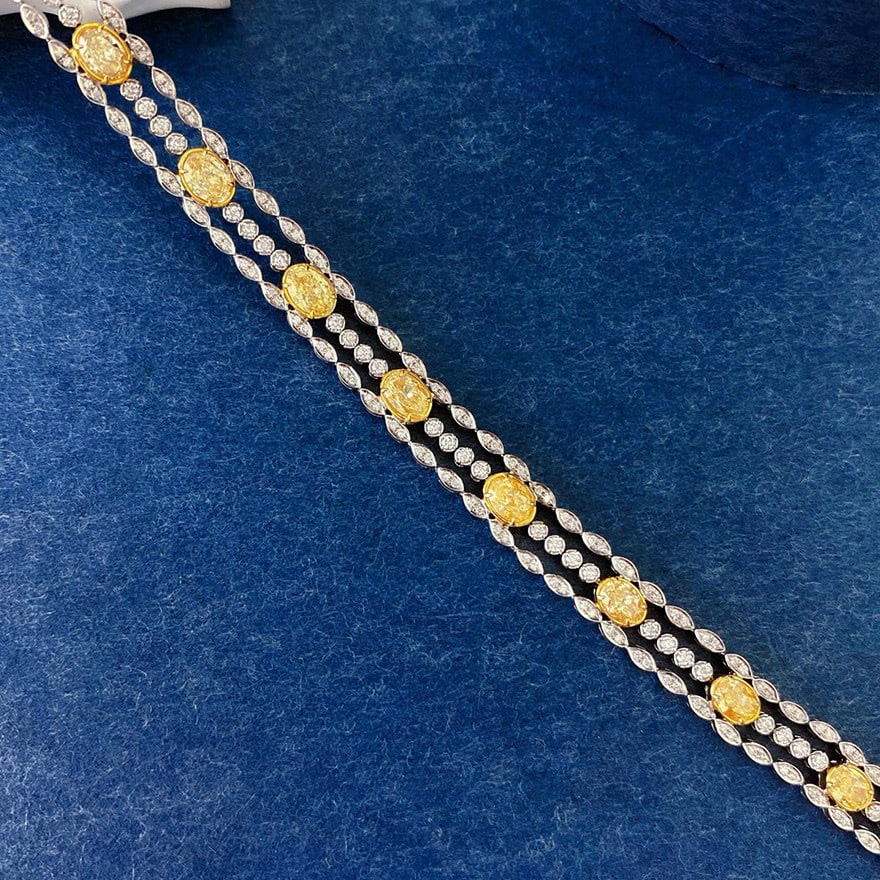 14k Gold 3.90 Ctw Natural Yellow Diamond & Diamond Bracelet: Ref:231144247 // gold content:14k gold // main gemstone:yellow diamond // shape:oval // carat weight:3. 00ct // color:yellow // treatment:natural // // adjacent gemstone 2 : diamond // shape:round