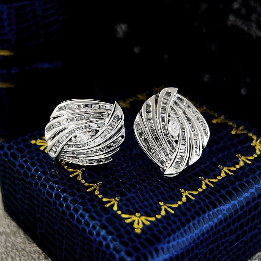 14k Gold 0.9 Ct Natural H Diamond Earrings: Ref:231144279 // gold content:14k gold // main gemstone:diamond // shape:multiple // carat weight:0. 9ct // clarity grade:vs-si // color:h // treatment:natural // Low Estimate: 3300Condition: