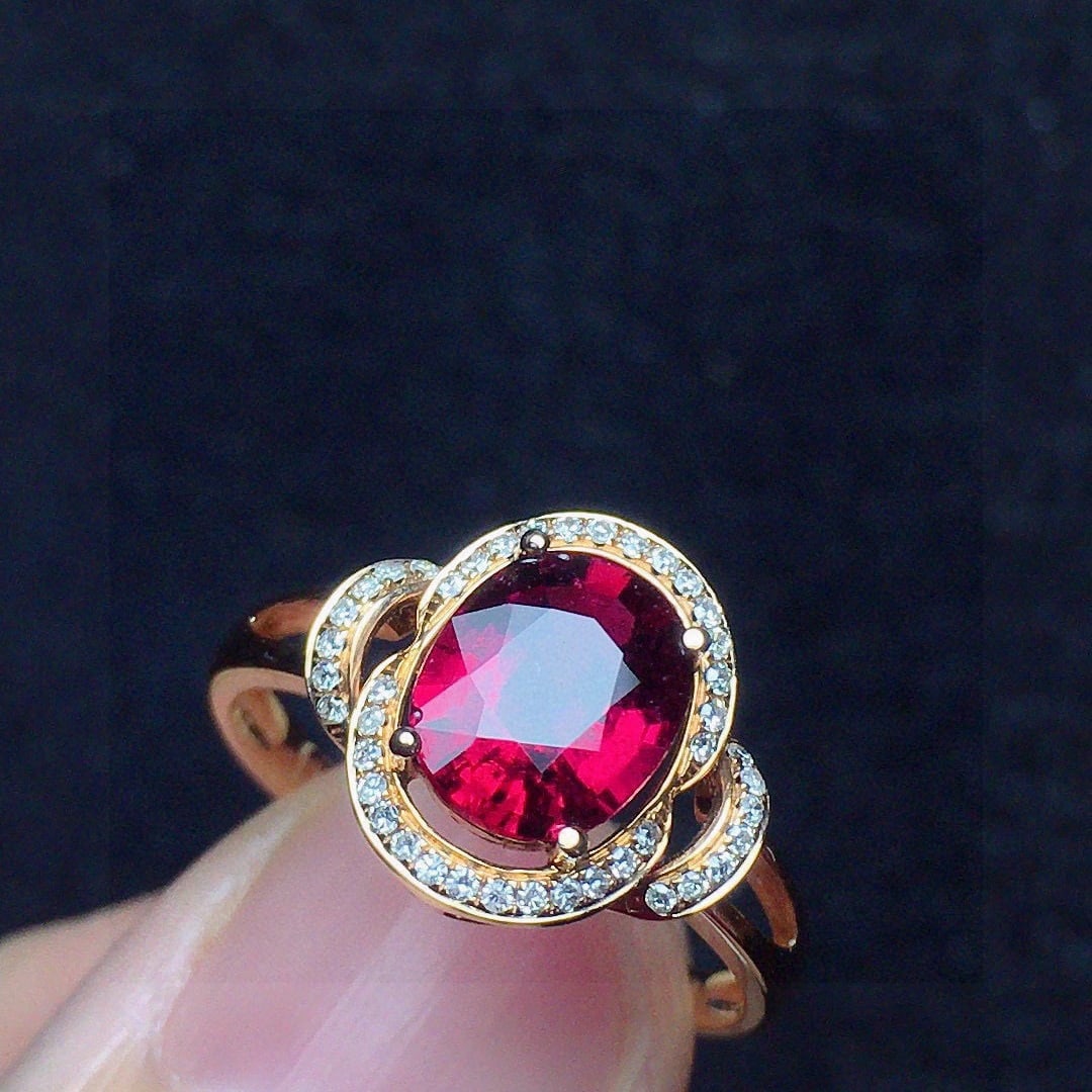 14k Gold 1.27 Ct Natural Tourmaline & Diamond Ring: Ref:231144361 // gold content:14k gold // ring size:7. 25us // // main gemstone:tourmaline // shape:oval // carat weight:1. 27ct // color:red // treatment:natural // // adjacent gemstone 2 : diamond /