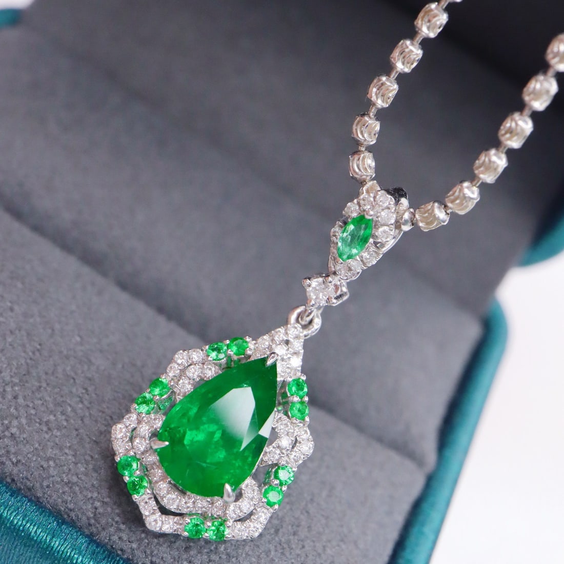 14k Gold 1.66 Ctw Natural Emerald & Diamond Pendant( Without Chain ): Ref:231144371 // gold content:14k gold // main gemstone:emerald // shape:pear // carat weight:1. 38ct // color:green // treatment:natural // // adjacent gemstone 2 : diamond // shape:round // carat