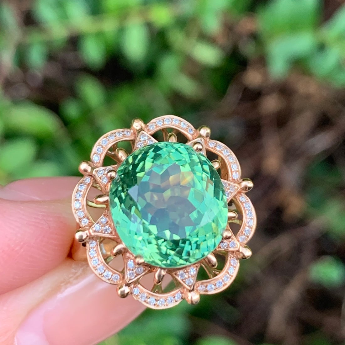 14k Gold 8.5 Ct Natural Tourmaline & Diamond Ring: Ref:231144381 // gold content:14k gold // ring size:7. 25us // // main gemstone:tourmaline // shape:oval // carat weight:8. 5ct // color:green // treatment:natural // // adjacent gemstone 2 :