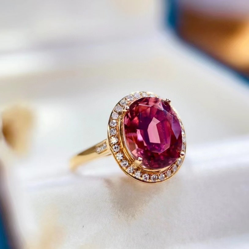 14k Gold 4.2 Ct Natural Tourmaline & Diamond Ring: Ref:231144397 // gold content:14k gold // ring size:7. 25us // // main gemstone:tourmaline // shape:oval // carat weight:4. 2ct // color:red // treatment:natural // // adjacent gemstone 2 :