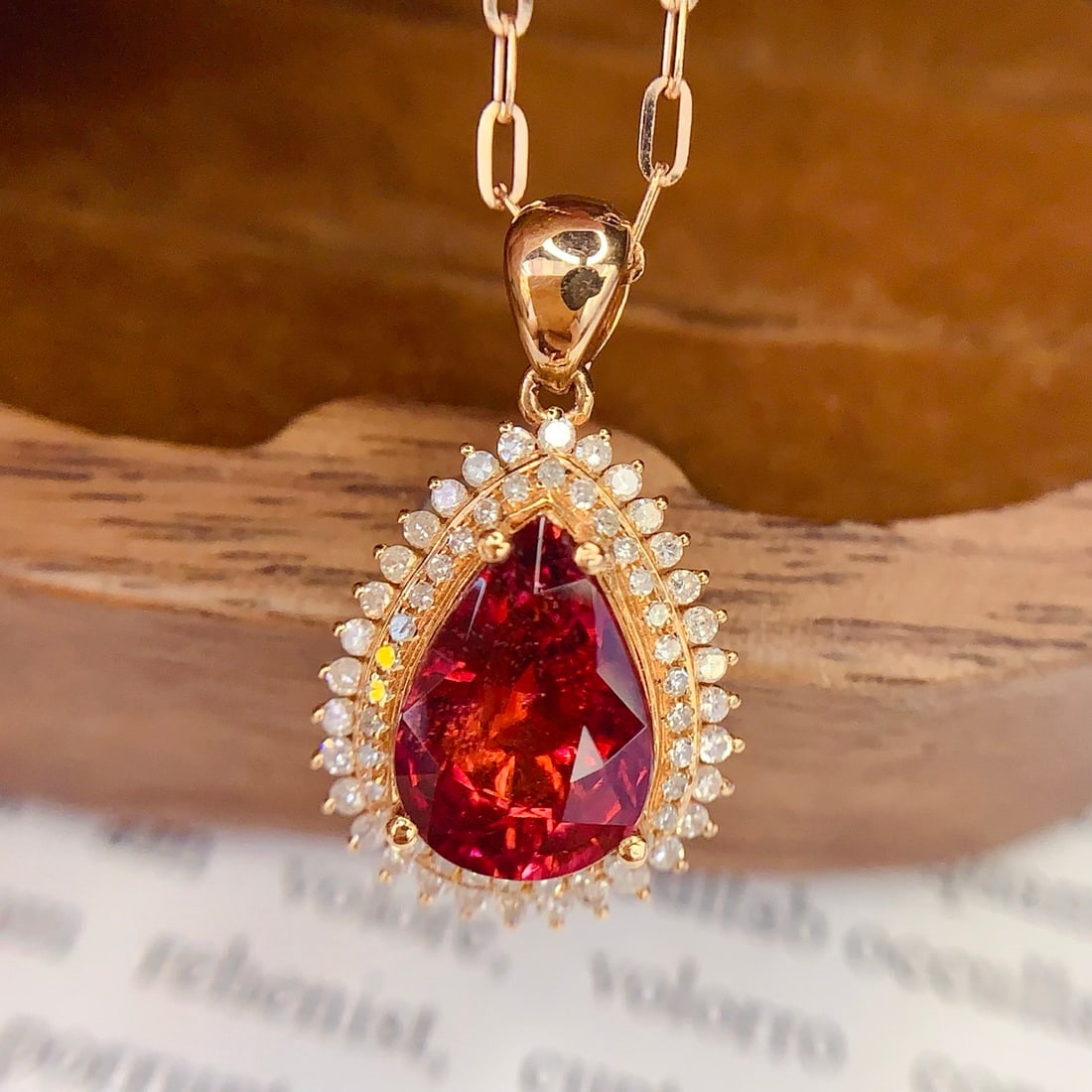 14k Gold 2.8 Ct Natural Tourmaline & Diamond Pendant( Without Chain ): Ref:231144420 // gold content:14k gold // main gemstone:tourmaline // shape:pear // carat weight:2. 8ct // color:red // treatment:natural // // adjacent gemstone 2 : diamond // number of stones:64