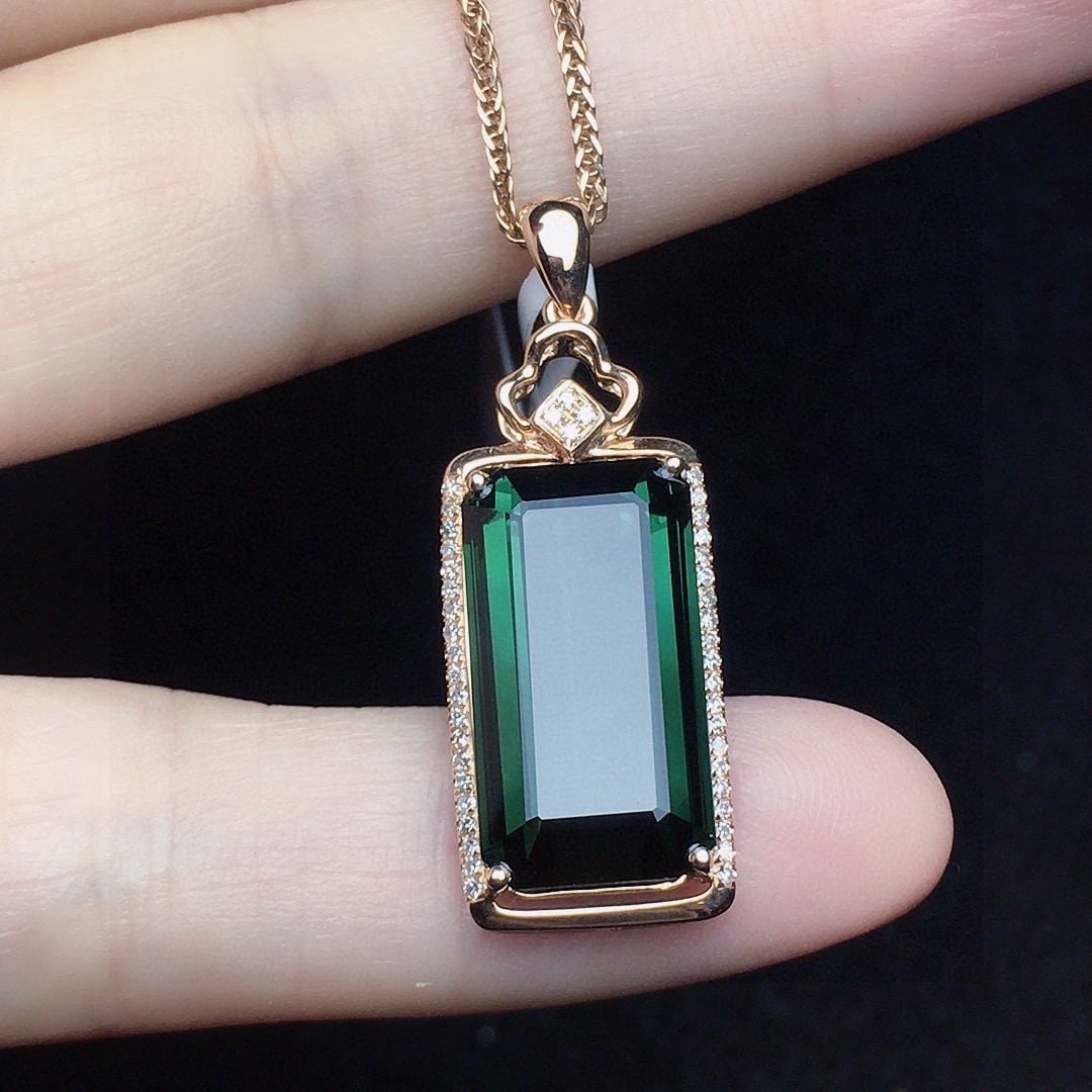 14k Gold 8.77 Ct Natural Tourmaline & Diamond Pendant( Without Chain ): Ref:231144435 // gold content:14k gold // main gemstone:tourmaline // shape:octagonal // carat weight:8. 77ct // color:green // treatment:natural // // adjacent gemstone 2 : diamond // number of stone