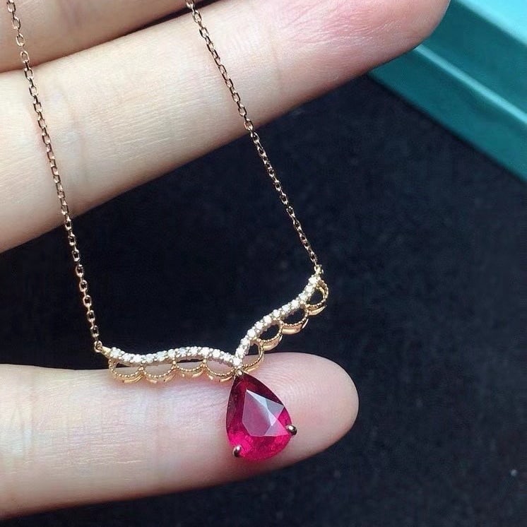 14k Gold 1.1 Ct Natural Tourmaline & Diamond Necklace: Ref:231144450 // gold content:14k gold // main gemstone:tourmaline // shape:pear // carat weight:1. 1ct // color:red // treatment:natural // // adjacent gemstone 2 : diamond // number of stones:23