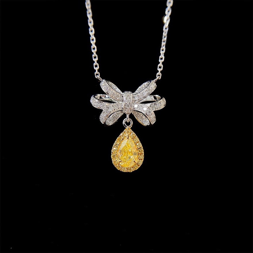 14k Gold 0.55 Ctw Natural Yellow Diamond & Diamond Necklace: Ref:231135046 // gold content:14k gold // main gemstone:yellow diamond // shape:pear // carat weight:0. 30ct // color:yellow // treatment:natural // // adjacent gemstone 2 : diamond // shape:round