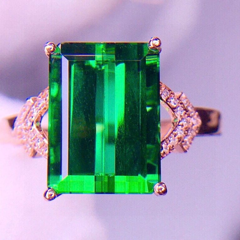 14k Gold 5.12 Ct Natural Tourmaline & Diamond Ring: Ref:231135156 // gold content:14k gold // ring size:7. 25us // // main gemstone:tourmaline // shape:octagonal // carat weight:5. 12ct // color:green // treatment:natural // // adjacent gemstone 2