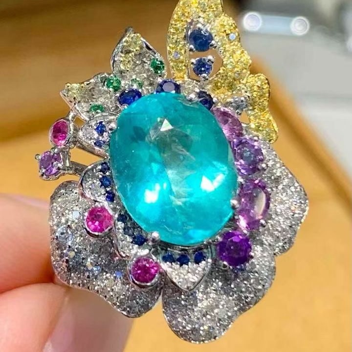 14k Gold 3.02 Ct Natural Paraiba Tourmaline & Diamond Ring: Ref:231135157 // gold content:14k gold // ring size:7. 25us // // main gemstone:paraiba tourmaline // shape:oval // carat weight:3. 02ct // color:blue // treatment:natural // // adjacent gemstone 2 :