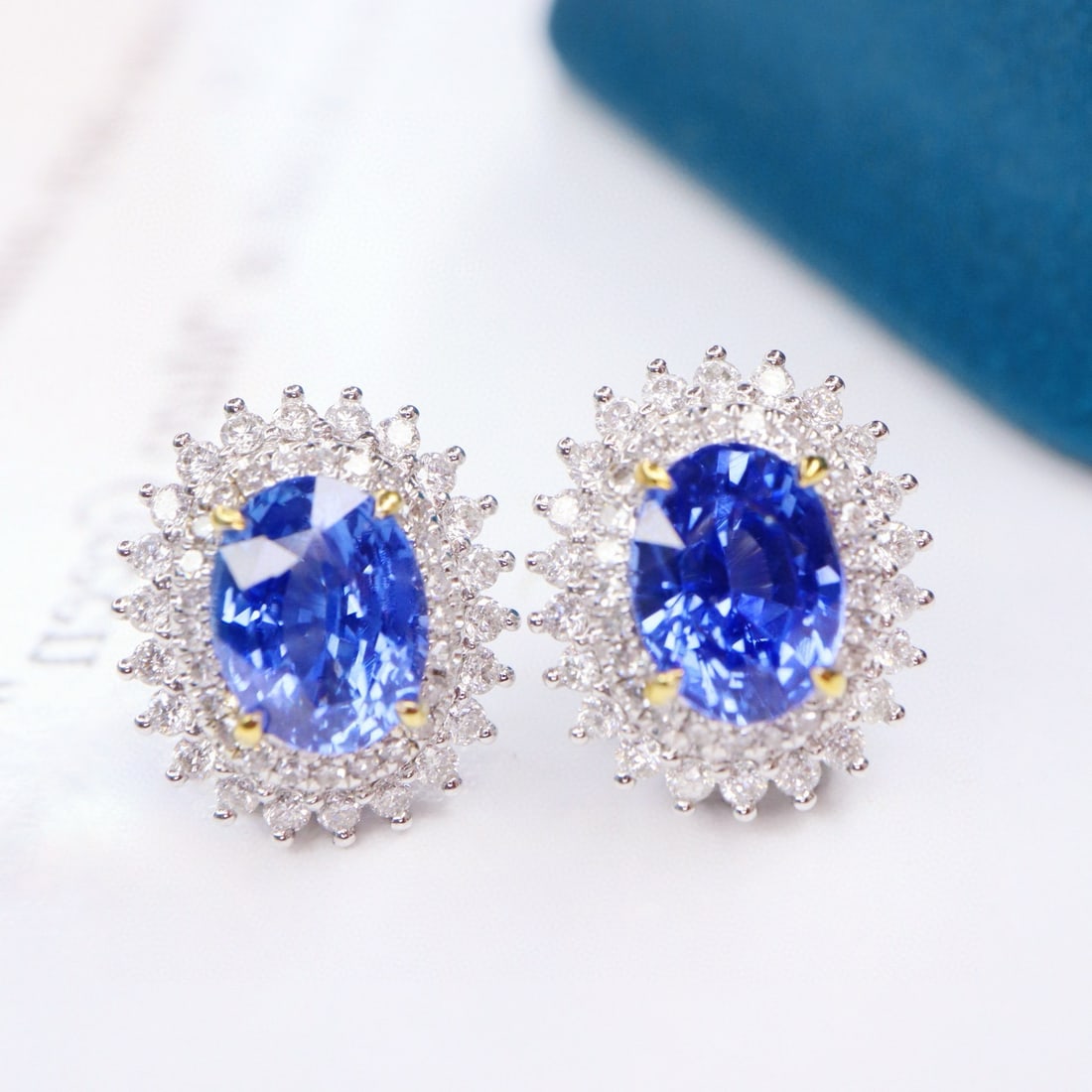 14k Gold 2.77 Ctw Natural Sapphire & Diamond Earrings: Ref:231135169 // gold content:14k gold // main gemstone:sapphire // shape:oval // carat weight:2. 27ct // color:blue // treatment:natural // // adjacent gemstone 2 : diamond // shape:round // carat