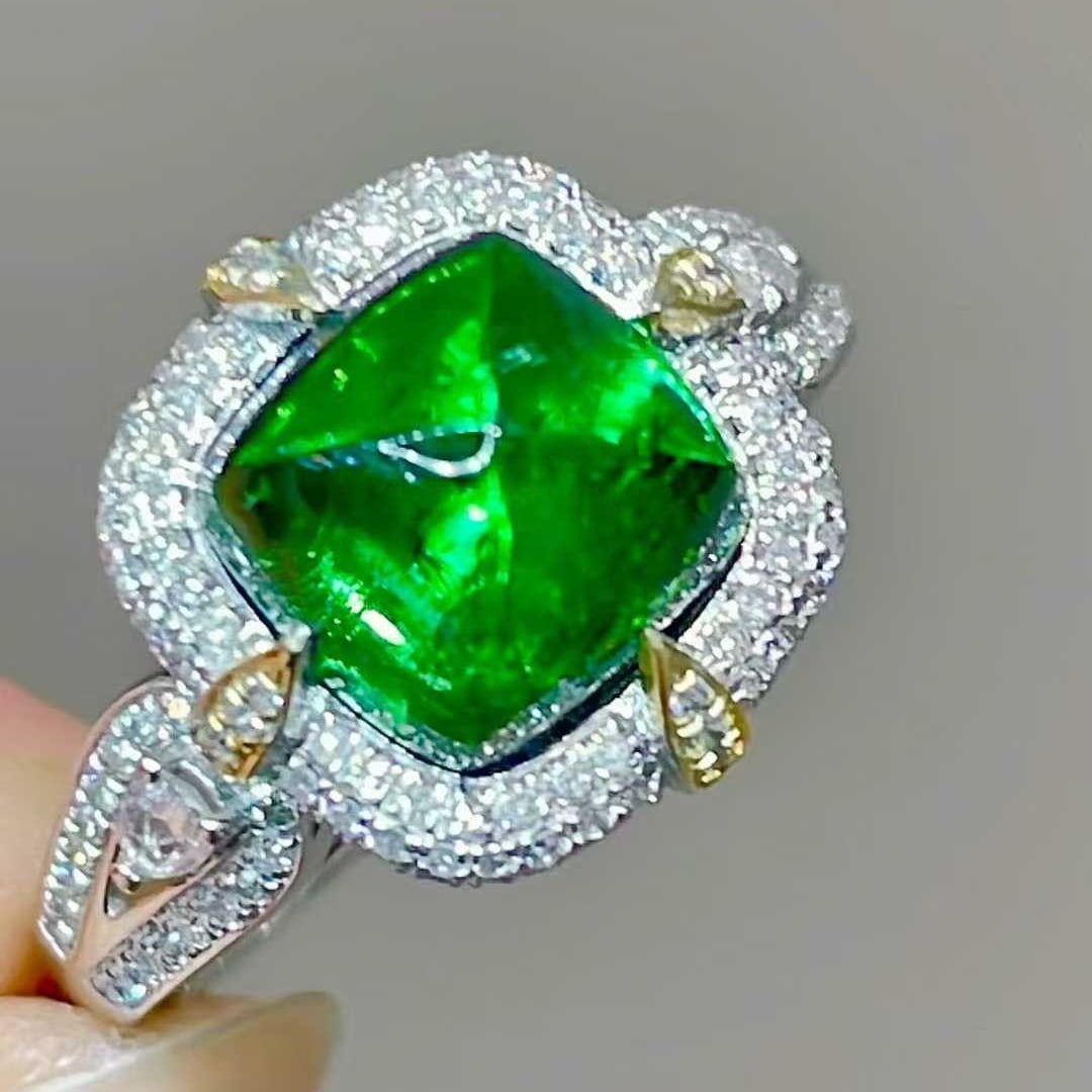 14k Gold 4.45 Ctw Natural Tourmaline & Diamond Ring: Ref:231135192 // gold content:14k gold // ring size:7. 25us // // main gemstone:tourmaline // shape:sugar-loaf // carat weight:3. 95ct // color:green // treatment:natural // // adjacent gemstone 2