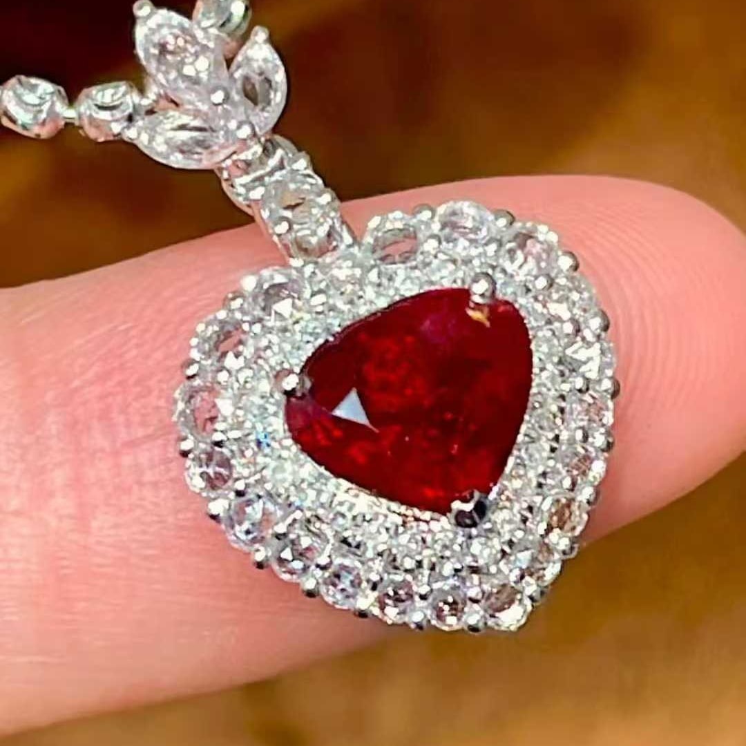 14k Gold 1 Ct Natural Ruby & Diamond & Sapphire Pendant( Without Chain ): Ref:231135207 // gold content:14k gold // main gemstone:ruby // shape:pear // carat weight:1ct // color:red // treatment:natural // // adjacent gemstone 2 : diamond // shape:round // clarity