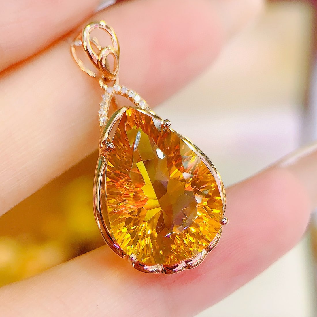 14k Gold 10.73 Ctw Natural Citrine & Diamond Pendant( Without Chain ): Ref:231135244 // gold content:14k gold // main gemstone:citrine // shape:pear // carat weight:10. 7ct // color:yellow // treatment:natural // // adjacent gemstone 2 : diamond // number of stones:10
