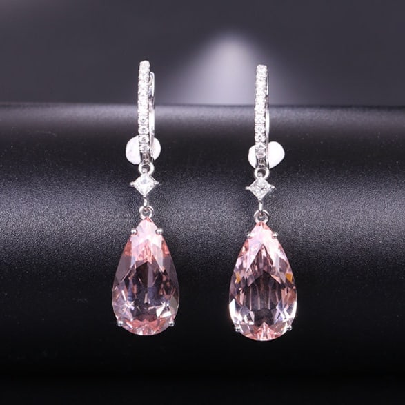 14k Gold 8.84 Ctw Natural Morganite & Diamond Earrings: Ref:231136040 // gold content:14k gold // main gemstone:morganite // shape:pear // carat weight:8. 52ct // color:pink // treatment:natural // // adjacent gemstone 2 : diamond // shape:multiple //