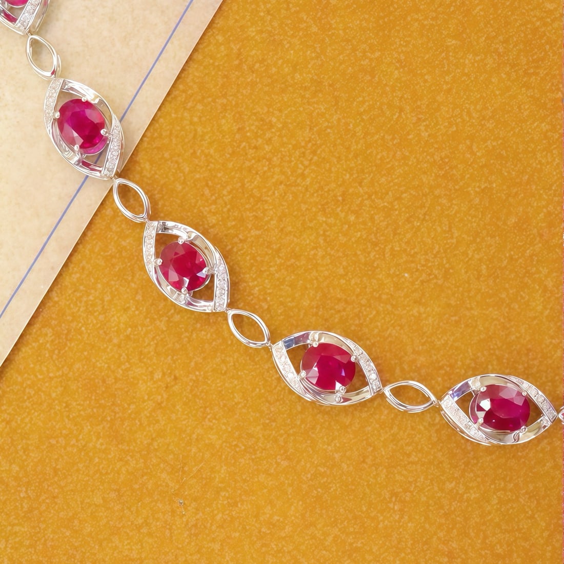 14k Gold 3.71 Ctw Natural Ruby & Diamond Bracelet: Ref:231136179 // gold content:14k gold // main gemstone:ruby // shape:oval // carat weight:3. 50ct // color:red // treatment:natural // // adjacent gemstone 2 : diamond // number of stones:70 //