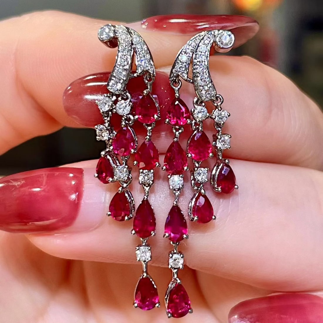 14k Gold 3.53 Ctw Natural Ruby & Diamond Earrings: Ref:231136227 // gold content:14k gold // main gemstone:ruby // shape:pear // carat weight:3. 03ct // color:red // treatment:natural // // adjacent gemstone 2 : diamond // shape:round // carat weight: