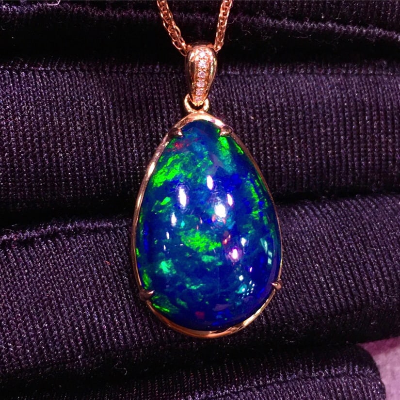 14k Gold 11.22 Ct Natural Opal & Diamond Pendant( Without Chain ): Ref:231136276 // gold content:14k gold // main gemstone:opal // shape:pear // carat weight:11. 22ct // color:color // treatment:natural // // adjacent gemstone 2 : diamond // shape:round // clarity