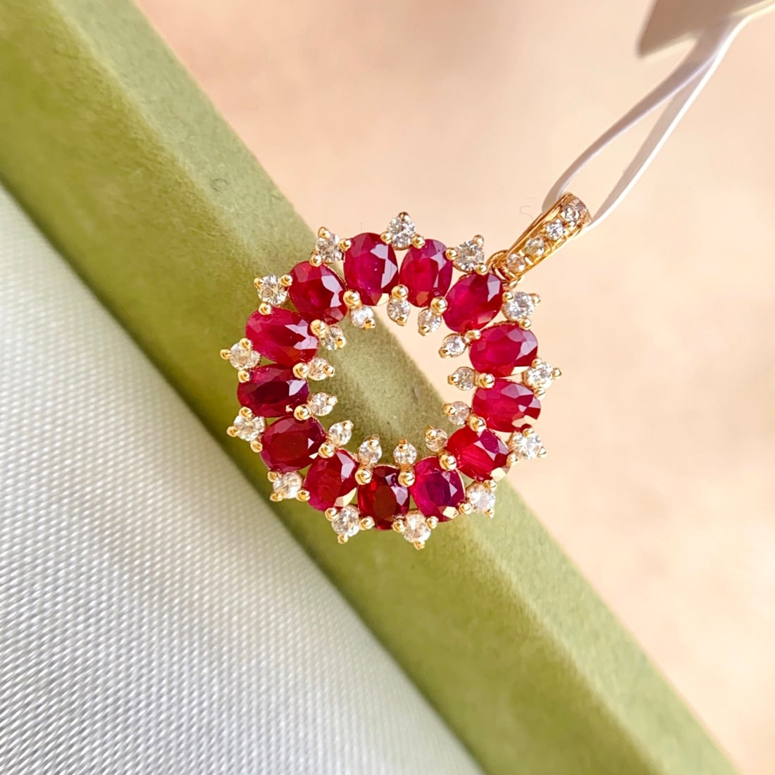 14k Gold 1.60 Ct Natural Ruby & Sapphire Pendant( Without Chain ): Ref:231136313 // gold content:14k gold // main gemstone:ruby // shape:oval // carat weight:1. 60ct // color:red // treatment:natural // // adjacent gemstone 2 : sapphire // number of stones:31 //