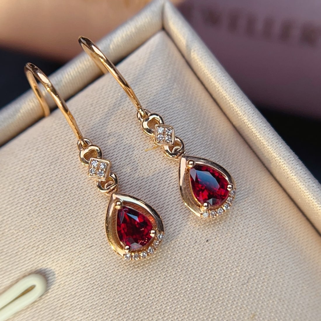 14k Gold 0.86 Ctw Natural Tourmaline & Diamond Earrings: Ref:231136349 // gold content:14k gold // main gemstone:tourmaline // shape:pear // carat weight:0. 8ct // color:red // treatment:natural // // adjacent gemstone 2 : diamond // number of stones:20