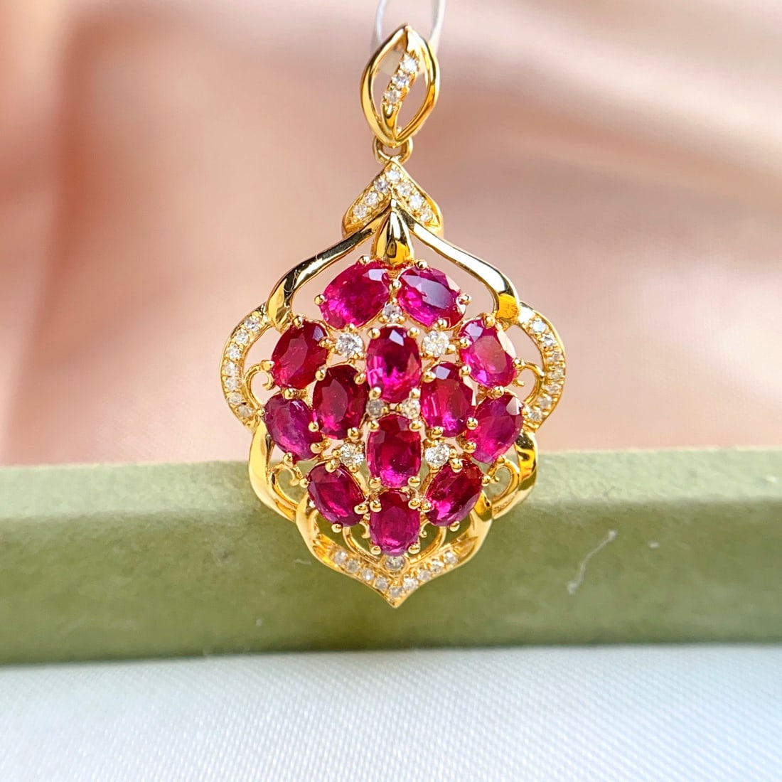 14k Gold 3.10 Ct Natural Ruby & Diamond Pendant( Without Chain ): Ref:231136358 // gold content:14k gold // main gemstone:ruby // shape:oval // carat weight:3. 10ct // color:red // treatment:natural // // adjacent gemstone 2 : diamond // number of stones:41 //
