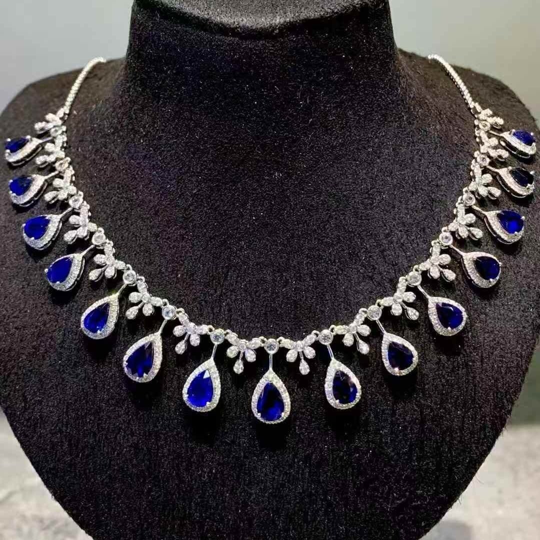 14k Gold 7.2 Ct Natural Sapphire & Diamond & Sapphire Necklace: Ref:231121003 // gold content:14k gold // main gemstone:sapphire // shape:pear // carat weight:7. 2ct // color:blue // treatment:natural // // adjacent gemstone 2 : diamond // shape:round // clarity g