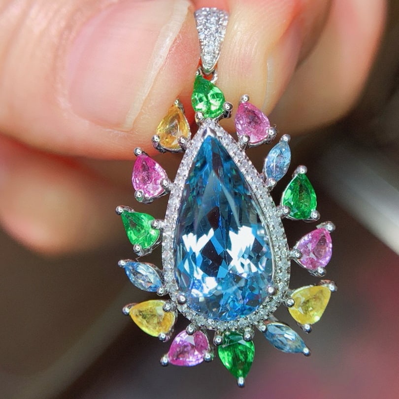 14k Gold 5.3 Ct Natural Aquamarine & Diamond & Coloured Gemstone Pendant( Without Chain ): Ref:231121021 // gold content:14k gold // main gemstone:aquamarine // shape:pear // carat weight:5. 3ct // color:blue // treatment:natural // // adjacent gemstone 2 : diamond // shape:round // clarity