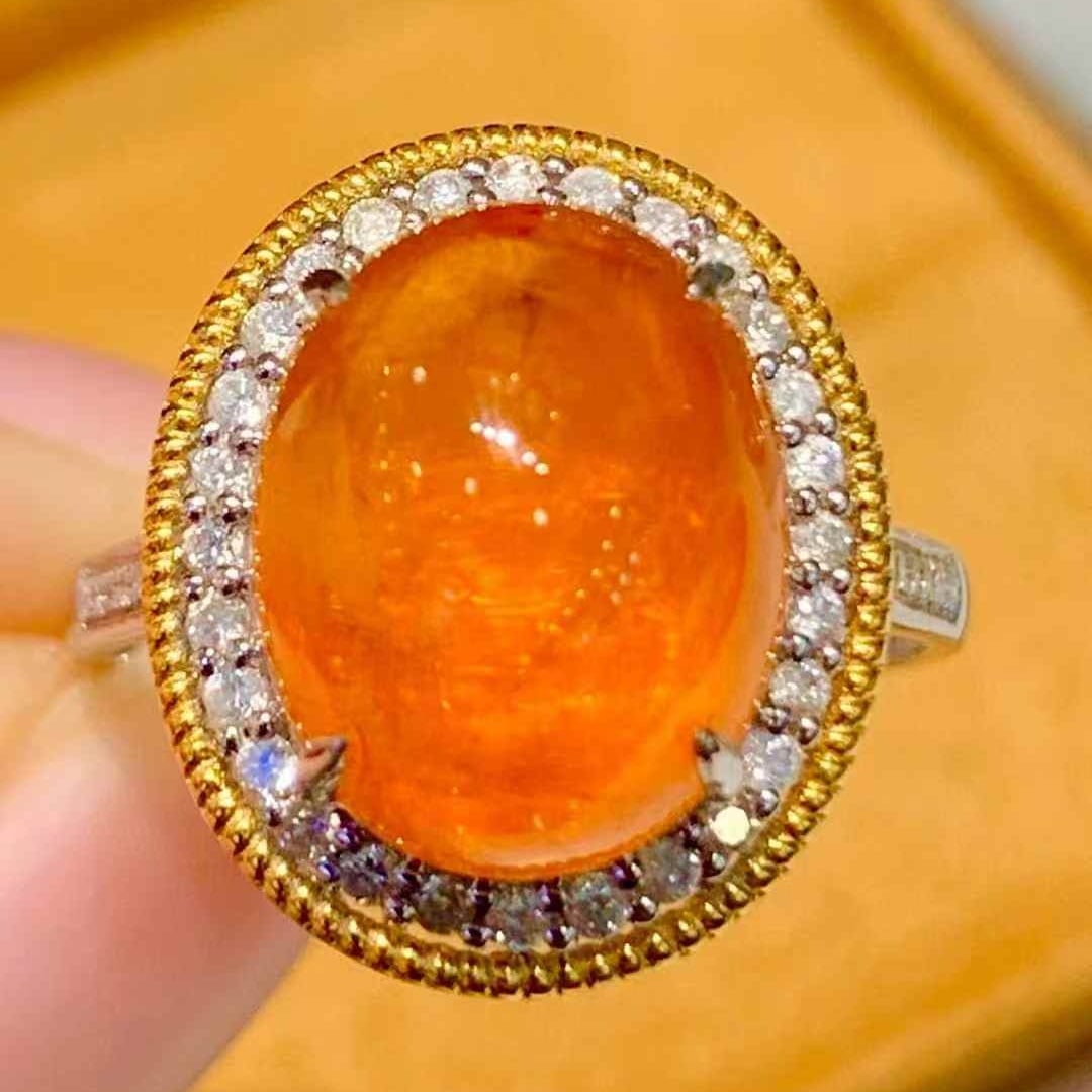 14k Gold 9.00 Ct Natural Spessartine & Diamond Ring: Ref:231121025 // gold content:14k gold // ring size:7. 25us // // main gemstone:spessartine // shape:oval // carat weight:9. 00ct // color:orange // treatment:natural // // adjacent gemstone 2 : diamo