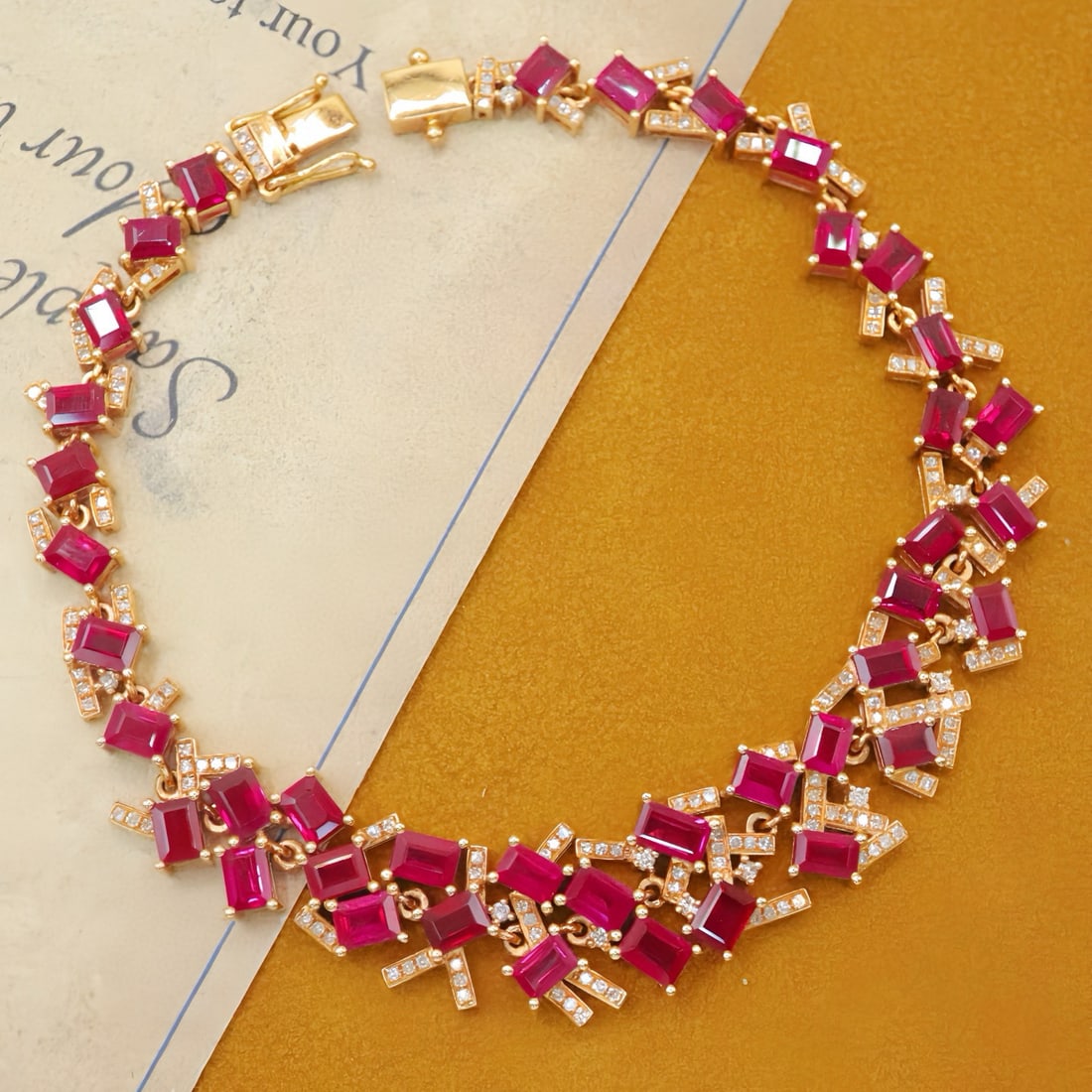 14k Gold 12.47 Ctw Natural Ruby & Diamond Bracelet: Ref:231121037 // gold content:14k gold // main gemstone:ruby // shape:rectangle // carat weight:11. 83ct // color:red // treatment:natural // // adjacent gemstone 2 : diamond // number of