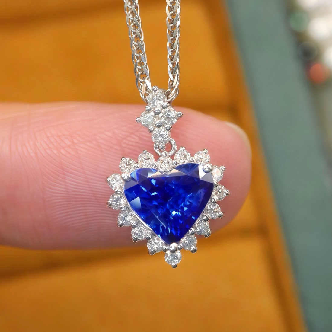 14k Gold 1.90 Ctw Natural Sapphire & Diamond Pendant( Without Chain ): Ref:231121065 // gold content:14k gold // main gemstone:sapphire // shape:heart // carat weight:1. 58ct // color:blue // treatment:natural // // adjacent gemstone 2 : diamond // number of stones:20 //