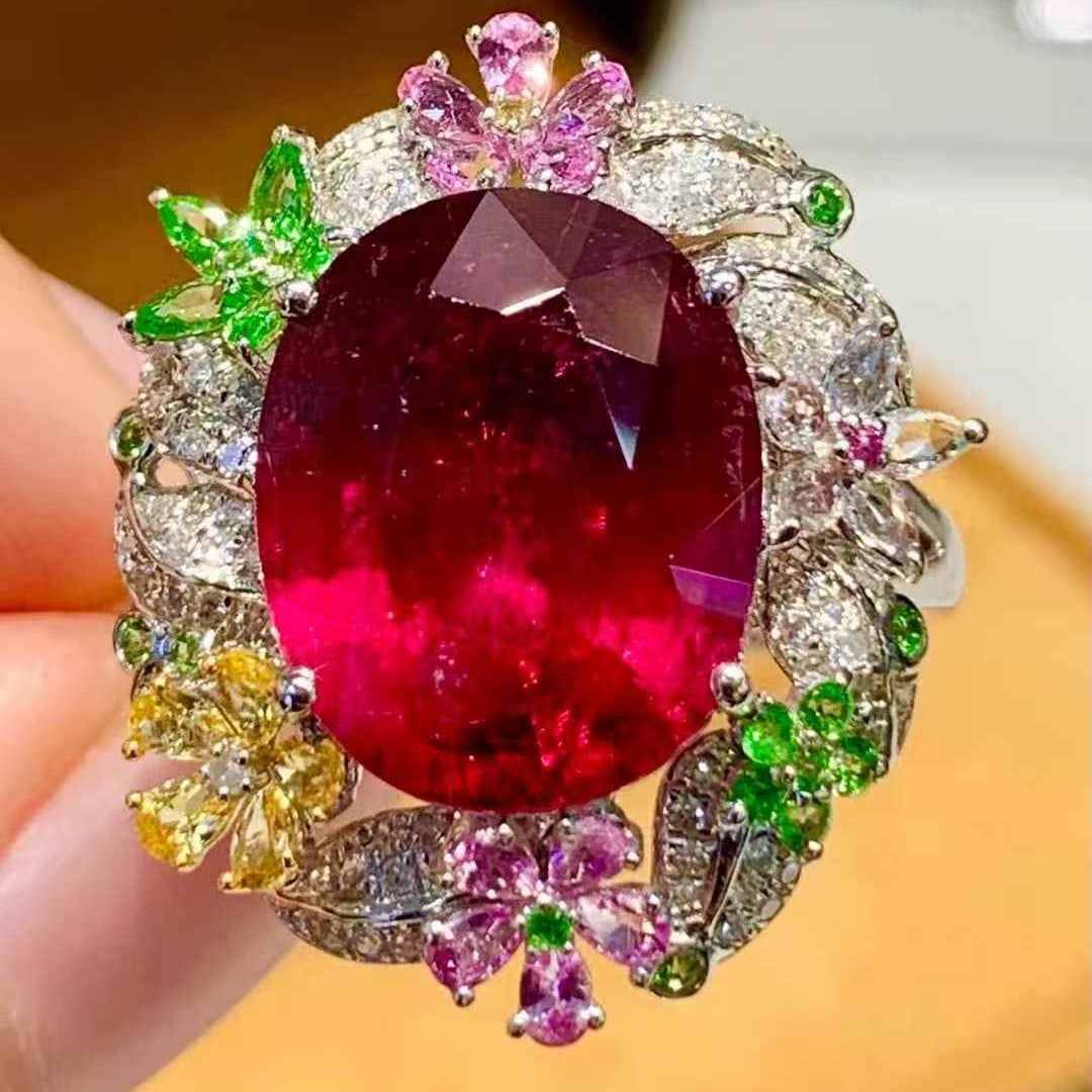 14k Gold 5.2 Ct Natural Tourmaline & Diamond & Coloured Gemstone Ring: Ref:231121088 // gold content:14k gold // ring size:7. 25us // // main gemstone:tourmaline // shape:oval // carat weight:5. 2ct // color:red // treatment:natural // // adjacent gemstone 2 : diamond //