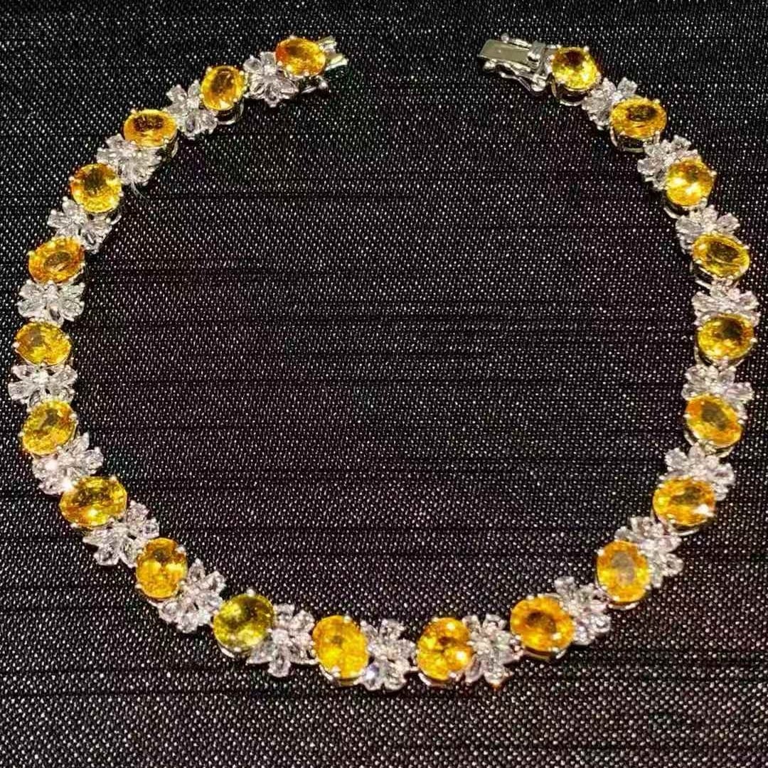 14k Gold 10.02 Ct Natural Sapphire & Sapphire Bracelet: Ref:231121101 // gold content:14k gold // main gemstone:sapphire // shape:oval // carat weight:10. 02ct // color:yellow // treatment:natural // // adjacent gemstone 2 : sapphire // shape:multiple // c