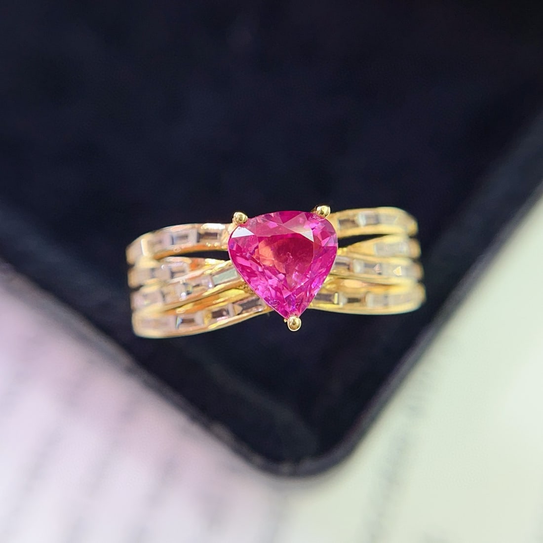 14k Gold 1.10 Ct Natural Ruby & Sapphire Ring: Ref:231121105 // gold content:14k gold // ring size:7. 25us // // main gemstone:ruby // shape:pear // carat weight:1. 10ct // color:pinkish red // treatment:natural // // adjacent gemstone 2 : sapphir