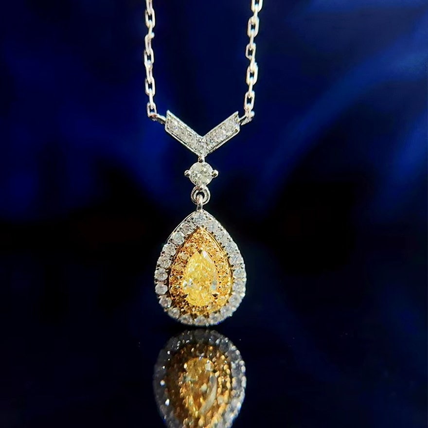14k Gold 0.50 Ctw Natural Yellow Diamond & Diamond Necklace: Ref:231121116 // gold content:14k gold // main gemstone:yellow diamond // shape:pear // carat weight:0. 23ct // color:yellow // treatment:natural // // adjacent gemstone 2 : diamond // shape:round //