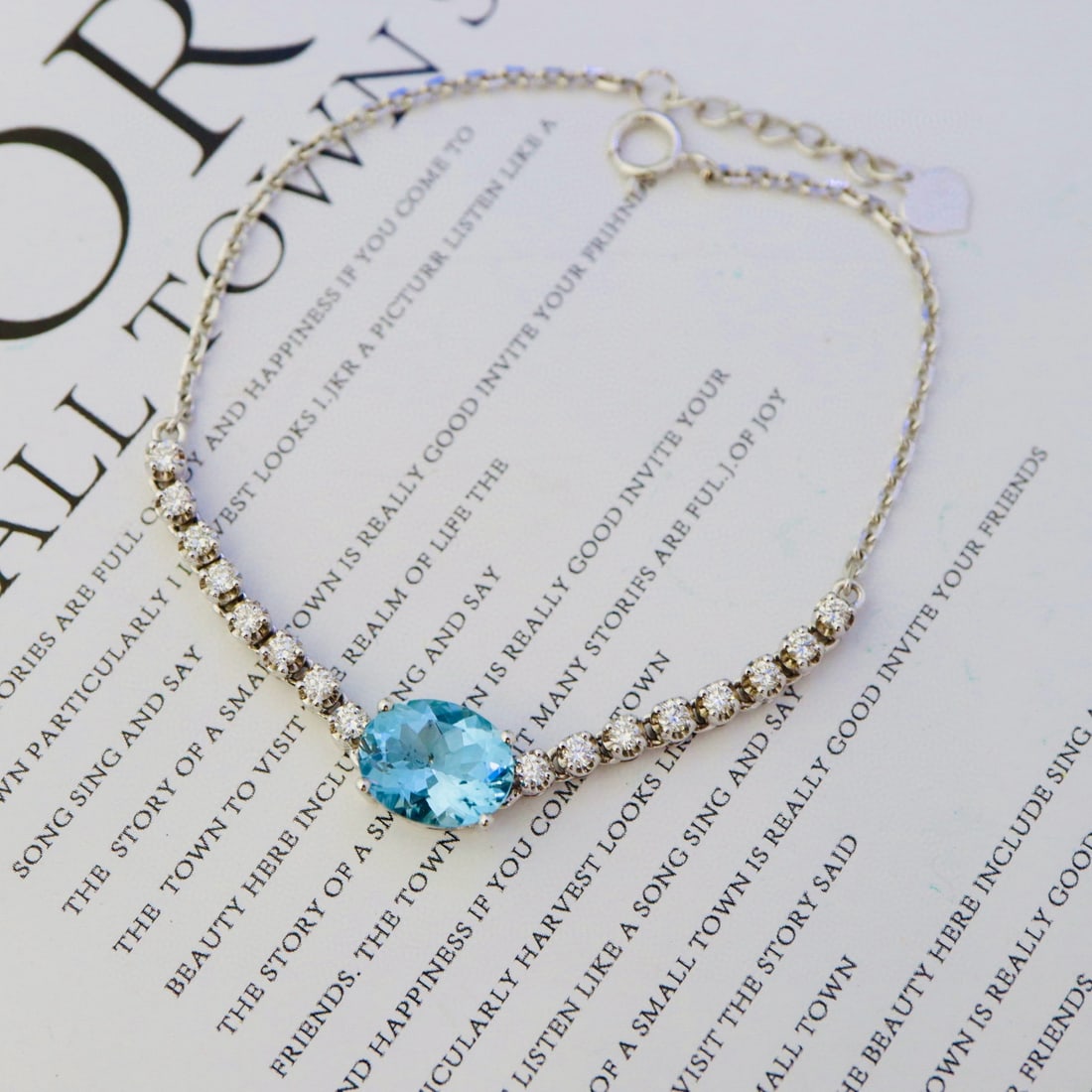 14k Gold 1.98 Ctw Natural Aquamarine & Diamond Bracelet: Ref:231121133 // gold content:14k gold // main gemstone:aquamarine // shape:oval // carat weight:1. 68ct // color:blue // treatment:natural // // adjacent gemstone 2 : diamond // shape:round //