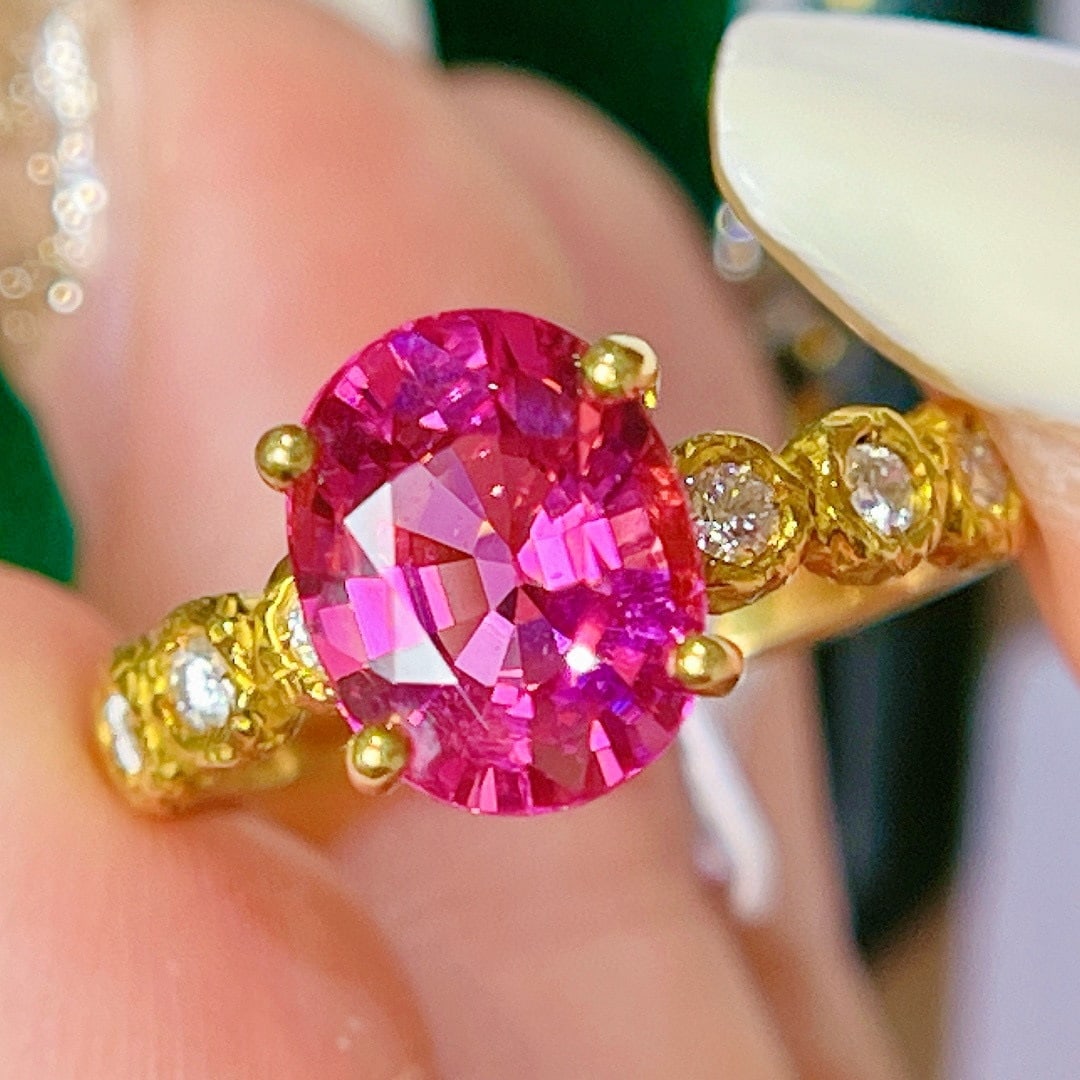 14k Gold 3.00 Ct Natural Tourmaline & Diamond Ring: Ref:231121136 // gold content:14k gold // ring size:7. 25us // // main gemstone:tourmaline // shape:oval // carat weight:3. 00ct // color:purplish red // treatment:natural // // adjacent gemstone 2 :