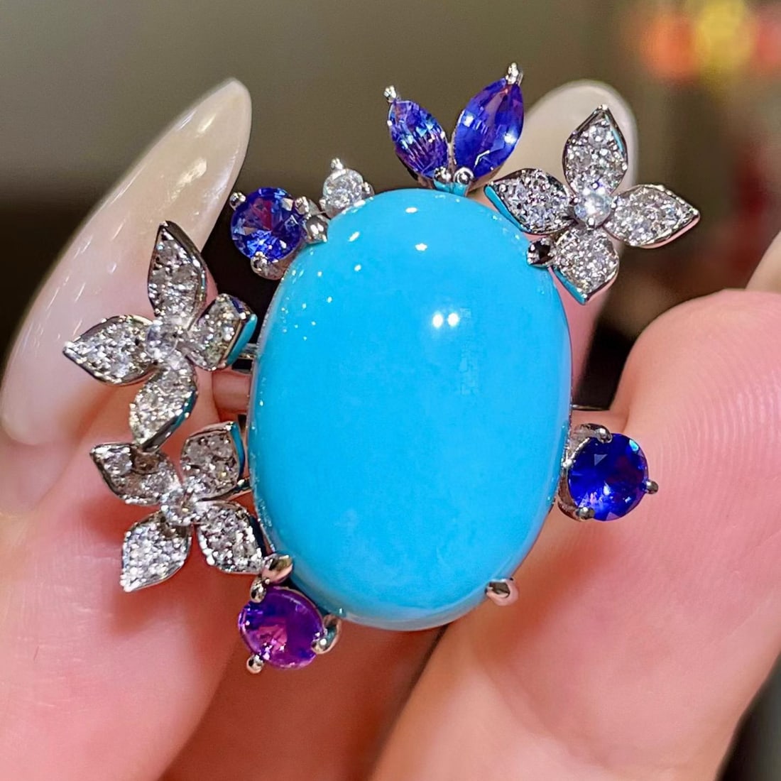 14k Gold 11.95 Ctw Natural Blue Turquoise & Sapphire Ring: Ref:231121138 // gold content:14k gold // ring size:7. 25us // // main gemstone:blue turquoise // shape:oval // carat weight:11. 10ct // color:blue // treatment:natural // // adjacent gemstone 2 : sap