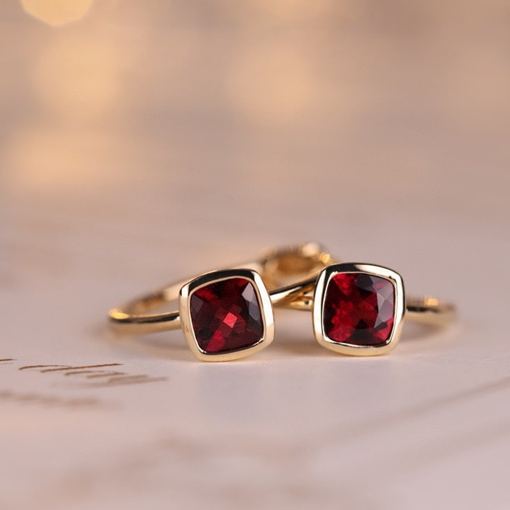 14k Gold 0.55 Ct Natural Tourmaline Earrings: Ref:231121183 // gold content:14k gold // main gemstone:tourmaline // shape:cushion // carat weight:0. 55ct // color:red // treatment:natural // Condition: New Low Estimate: 2100.00 High Estimate: 32