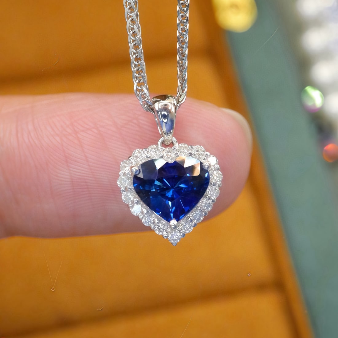 14k Gold 1.25 Ctw Natural Sapphire & Diamond Pendant( Without Chain ): Ref:231121197 // gold content:14k gold // main gemstone:sapphire // shape:heart // carat weight:1. 07ct // color:blue // treatment:natural // // adjacent gemstone 2 : diamond // number of stones:18