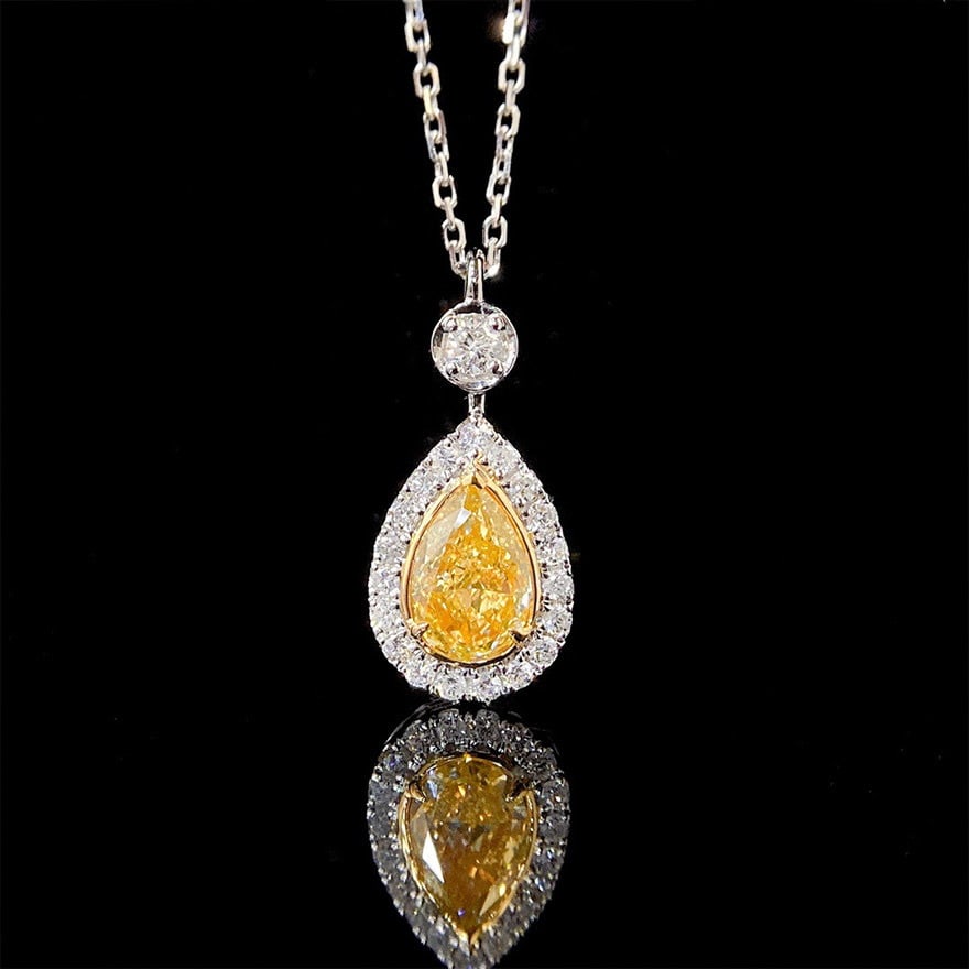 14k Gold 0.94 Ctw Natural Yellow Diamond & Diamond Pendant( Without Chain ): Ref:231121209 // gold content:14k gold // main gemstone:yellow diamond // shape:pear // carat weight:0. 70ct // color:yellow // treatment:natural // // adjacent gemstone 2 : diamond // shape:round //