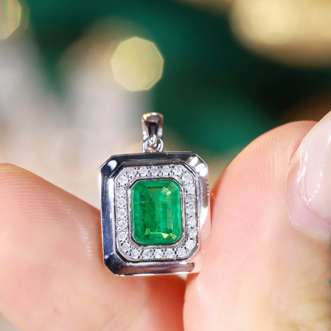 14k Gold 0.96 Ctw Natural Emerald & Diamond Pendant( Without Chain ): Ref:231121218 // gold content:14k gold // main gemstone:emerald // shape:octagonal // carat weight:0. 83ct // color:green // treatment:natural // // adjacent gemstone 2 : diamond // shape:round // car