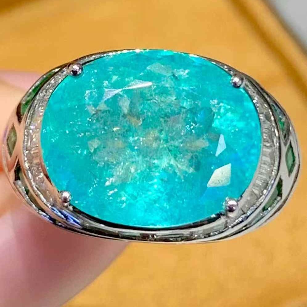 14k Gold 6.88 Ct Natural Paraiba Tourmaline & Diamond Ring: Ref:231121226 // gold content:14k gold // ring size:7. 25us // // main gemstone:paraiba tourmaline // shape:oval // carat weight:6. 88ct // color:blue // treatment:natural // // adjacent gemstone 2 :