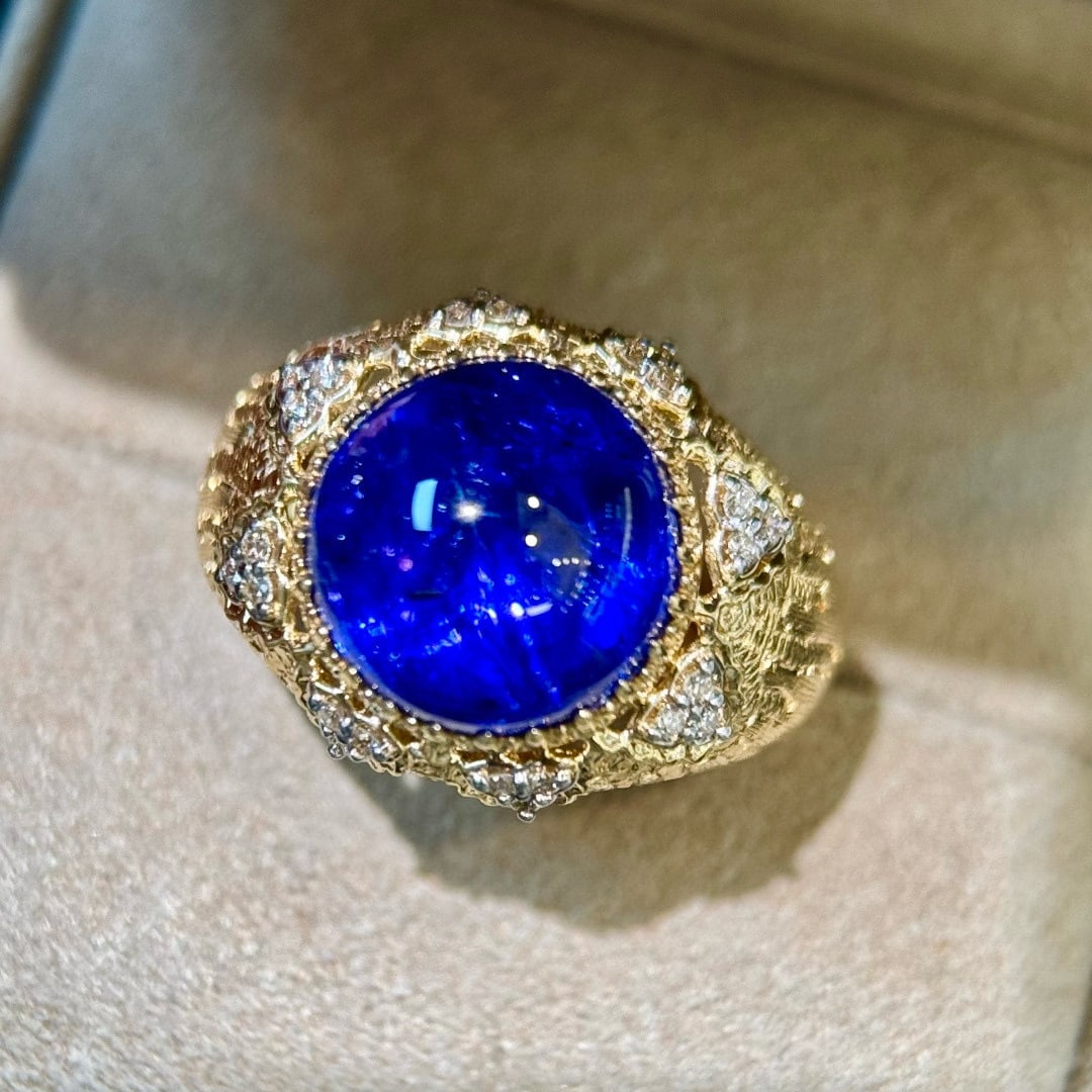 14k Gold 6.63 Ct Natural Tanzanite & Diamond Ring: Ref:231121232 // gold content:14k gold // ring size:7. 25us // // main gemstone:tanzanite // shape:round // carat weight:6. 63ct // color:blue // treatment:natural // cut grade:g // // adjacent gemsto