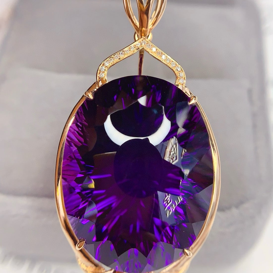14k Gold 40.8 Ct Natural Amethyst & Diamond Pendant( Without Chain ): Ref:231121239 // gold content:14k gold // main gemstone:amethyst // shape:oval // carat weight:40. 8ct // color:purple // treatment:natural // // adjacent gemstone 2 : diamond // number of stones:19 /