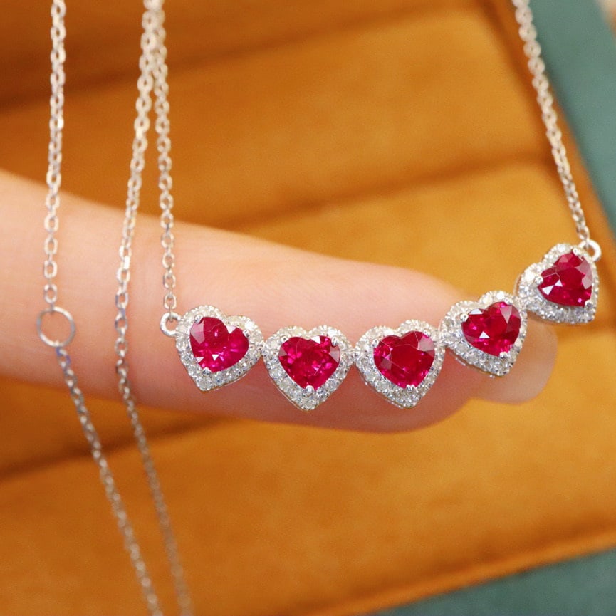 14k Gold 1.72 Ctw Natural Ruby & Diamond Necklace: Ref:231121244 // gold content:14k gold // main gemstone:ruby // shape:heart // carat weight:1. 50ct // color:red // treatment:natural // // adjacent gemstone 2 : diamond // number of stones:75 // shap