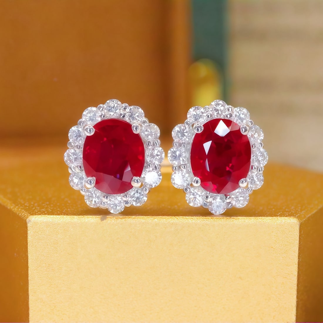 14k Gold 1.43 Ctw Vivid Red Natural Ruby & Diamond Earrings: Ref:231122112 // gold content:14k gold // main gemstone:ruby // shape:oval // carat weight:1. 07ct // color:vivid red // treatment:natural // // adjacent gemstone 2 : diamond // number of stones:24 //